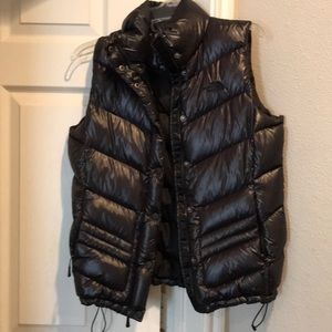 Black North Face puffy vest